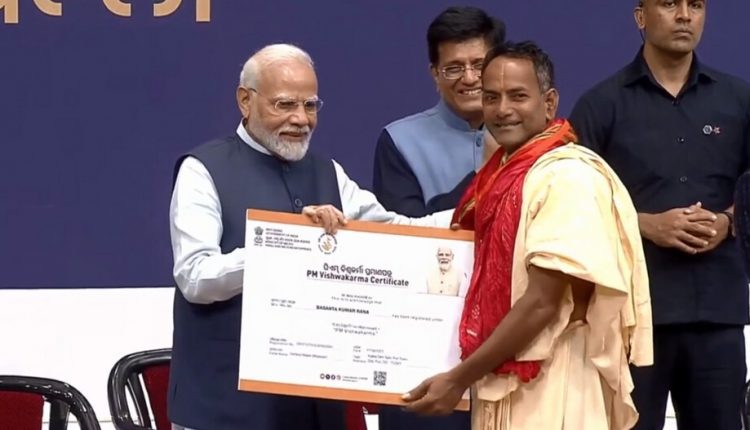 PM Felicitates Artisan and Servitor of Puri Jagannath Temple Basant Kumar Rana during Launching Vishwakarma Scheme